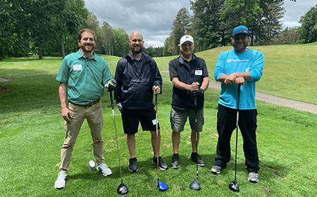 Momentum golfers at the AIAM golf outing