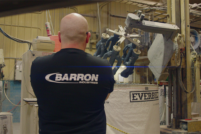 Barron Industries employee overseeing process