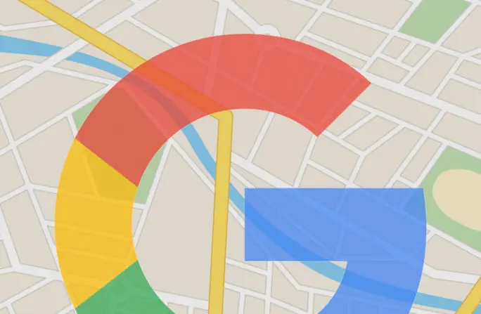 Google Maps logo overlaying a city street map with colorful design elements.