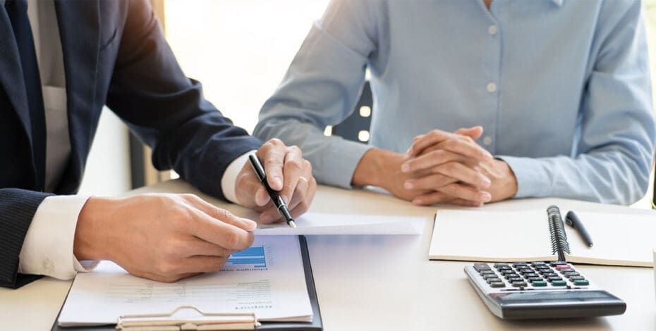 wealth management concept, business man and team analyzing financial statement for planning financial customer case in office.