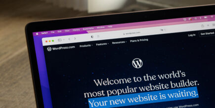 A laptop screen that shows the WordPress home page.
