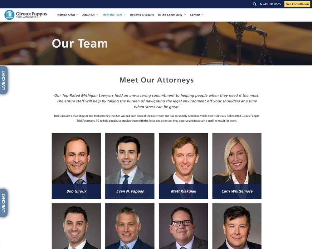 Giroux Pappas Trial Attorneys team page featuring seven smiling lawyers in formal attire.
