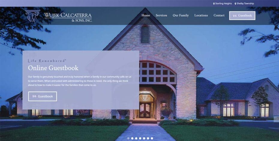 Wujek-Calcaterra funeral home facade with online guestbook and visitation portraits.