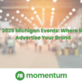 A blurred image of an event packed with people. The title "2026 Michigan Events: Where to Advertise Your Brand' are overlayed.