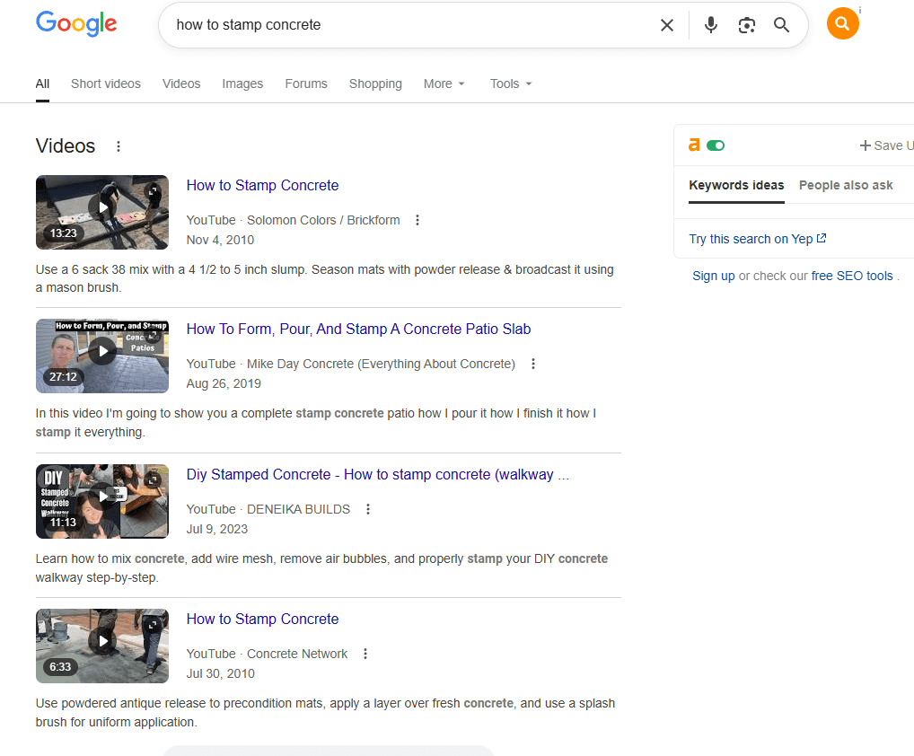 The search 'how to stamp concrete,' which populates a bunch of videos